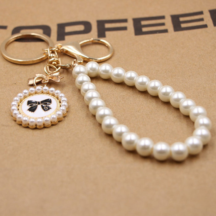 Jewelry WholesaleWholesale Bow Pearl Bracelet Alloy Keychain JDC-KC-Zuge031 Keychains 祖格 %variant_option1% %variant_option2% %variant_option3%  Factory Price JoyasDeChina Joyas De China