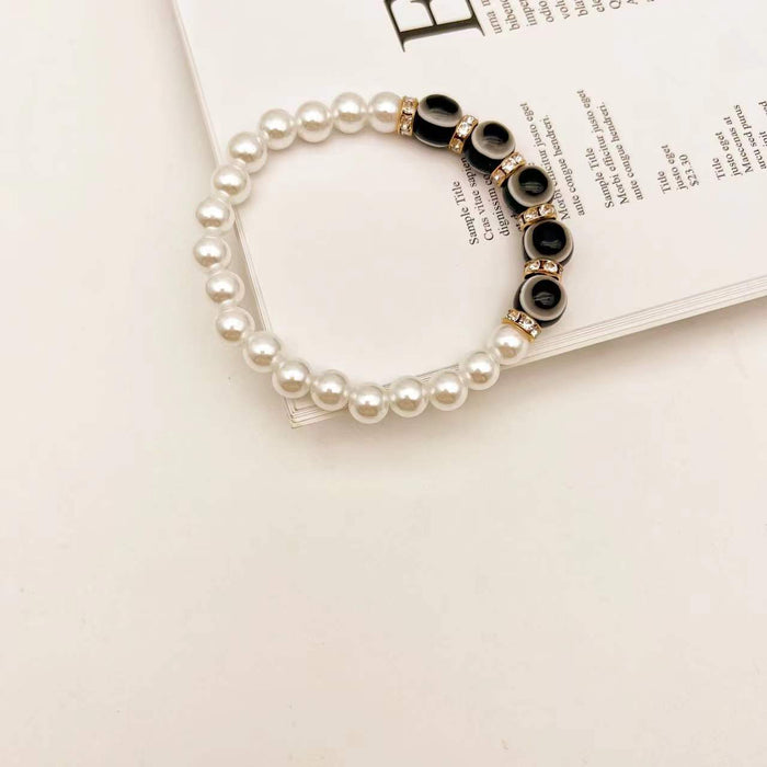 Wholesale Retro Devil Eyes Blue Eyes Girlfriends Pearl Bracelet MOQ≥2 JDC-BT- QingH001