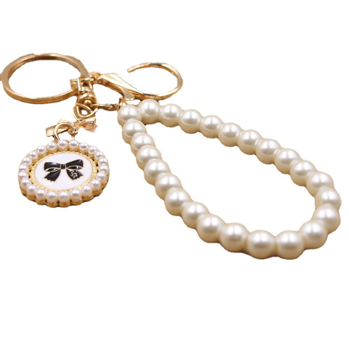 Jewelry WholesaleWholesale Bow Pearl Bracelet Alloy Keychain JDC-KC-Zuge031 Keychains 祖格 %variant_option1% %variant_option2% %variant_option3%  Factory Price JoyasDeChina Joyas De China