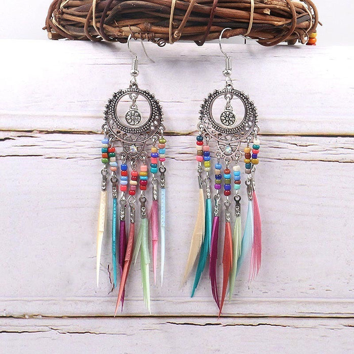 Jewelry WholesaleWholesale Bohemian Cutout Long Feather Earrings JDC-ES-LY011 Earrings 乐钰 %variant_option1% %variant_option2% %variant_option3%  Factory Price JoyasDeChina Joyas De China