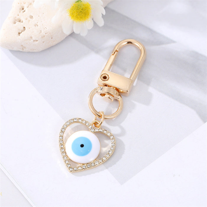 Jewelry WholesaleWholesale Dot Drill Carved Alloy Love Eye Keychain MOQ≥6 JDC-KC-Juej006 Keychains 觉际 %variant_option1% %variant_option2% %variant_option3%  Factory Price JoyasDeChina Joyas De China