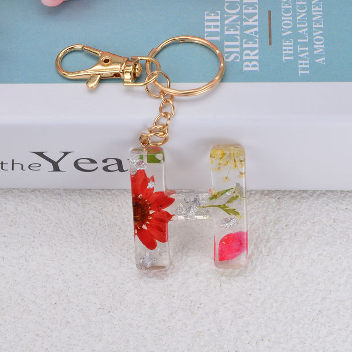 Jewelry WholesaleWholesale dried flower daisy 26 letters Keychain JDC-KC-YiWa002 Keychains 伊娃 %variant_option1% %variant_option2% %variant_option3%  Factory Price JoyasDeChina Joyas De China