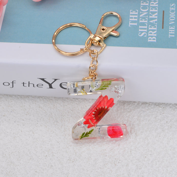 Jewelry WholesaleWholesale dried flower daisy 26 letters Keychain JDC-KC-YiWa002 Keychains 伊娃 %variant_option1% %variant_option2% %variant_option3%  Factory Price JoyasDeChina Joyas De China