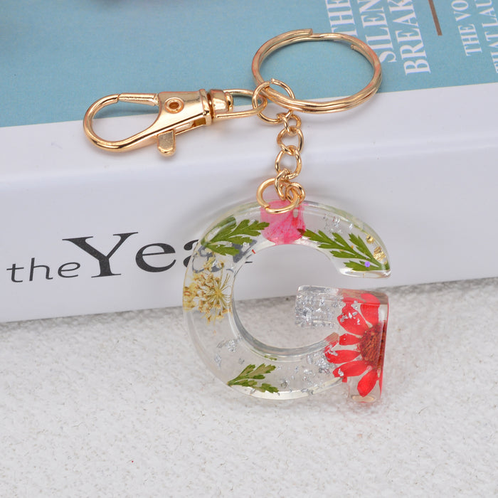 Jewelry WholesaleWholesale dried flower daisy 26 letters Keychain JDC-KC-YiWa002 Keychains 伊娃 %variant_option1% %variant_option2% %variant_option3%  Factory Price JoyasDeChina Joyas De China