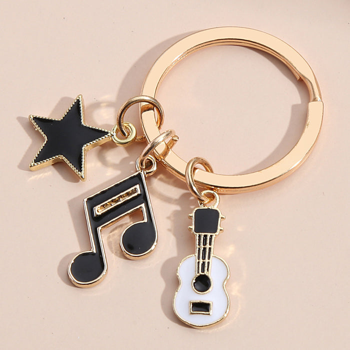 Jewelry WholesaleWholesale violin note keyboard headphone key pendant MOQ≥2 JDC-KC-XiangH010 Keychains 湘怀 %variant_option1% %variant_option2% %variant_option3%  Factory Price JoyasDeChina Joyas De China