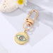 Jewelry WholesaleWholesale Dot Drill Carved Alloy Love Eye Keychain MOQ≥6 JDC-KC-Juej006 Keychains 觉际 %variant_option1% %variant_option2% %variant_option3%  Factory Price JoyasDeChina Joyas De China