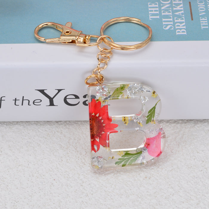 Jewelry WholesaleWholesale dried flower daisy 26 letters Keychain JDC-KC-YiWa002 Keychains 伊娃 %variant_option1% %variant_option2% %variant_option3%  Factory Price JoyasDeChina Joyas De China