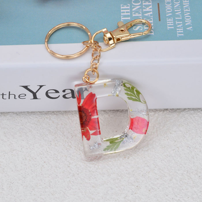 Jewelry WholesaleWholesale dried flower daisy 26 letters Keychain JDC-KC-YiWa002 Keychains 伊娃 %variant_option1% %variant_option2% %variant_option3%  Factory Price JoyasDeChina Joyas De China