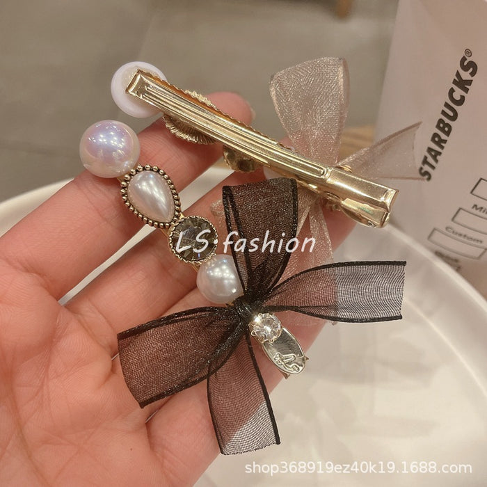 Wholesale Rhinestone Pearl Bow Hairpin Side Side JDC-HC-LiS009