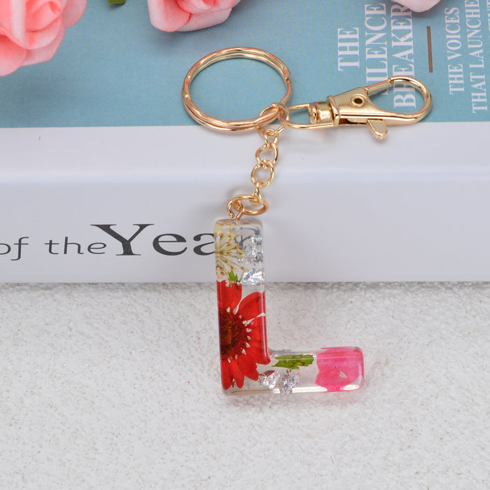 Jewelry WholesaleWholesale dried flower daisy 26 letters Keychain JDC-KC-YiWa002 Keychains 伊娃 %variant_option1% %variant_option2% %variant_option3%  Factory Price JoyasDeChina Joyas De China