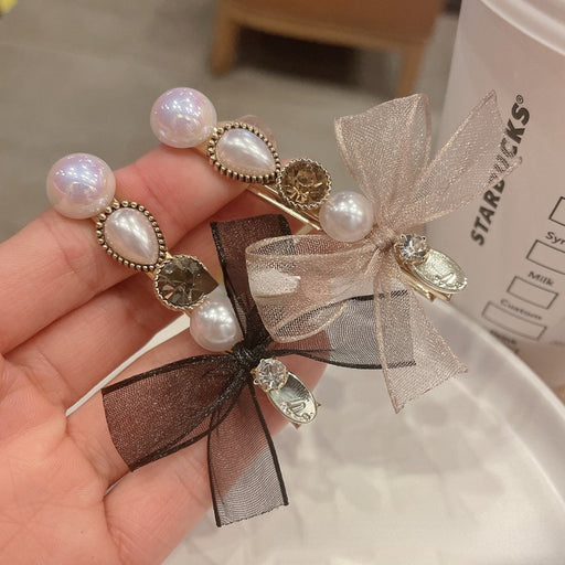 Jewelry WholesaleWholesale Rhinestone Pearl Bow Hairpin Side Side JDC-HC-LiS009 Hair Clips 栎尚 %variant_option1% %variant_option2% %variant_option3%  Factory Price JoyasDeChina Joyas De China