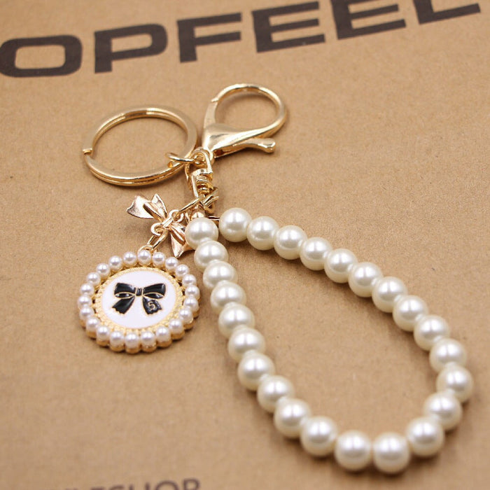 Wholesale Bow Pearl Bracelet Alloy Keychain JDC-KC-Zuge031 Keychains 祖格 Wholesale Jewelry JoyasDeChina Joyas De China