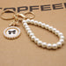 Wholesale Bow Pearl Bracelet Alloy Keychain JDC-KC-Zuge031 Keychains 祖格 A Wholesale Jewelry JoyasDeChina Joyas De China