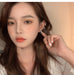 Wholesale diamond-set silver butterfly combined with gold earhook JDC-ES-ChiH006 Earrings 池豪 Silver left ear Wholesale Jewelry JoyasDeChina Joyas De China