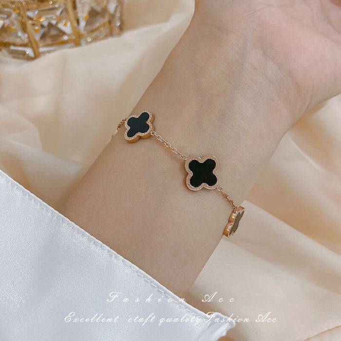 Wholesale titanium steel shell lucky four-petal flower bracelet JDC-BT-BaoY013 Bracelet 宝钰 Black Wholesale Jewelry JoyasDeChina Joyas De China