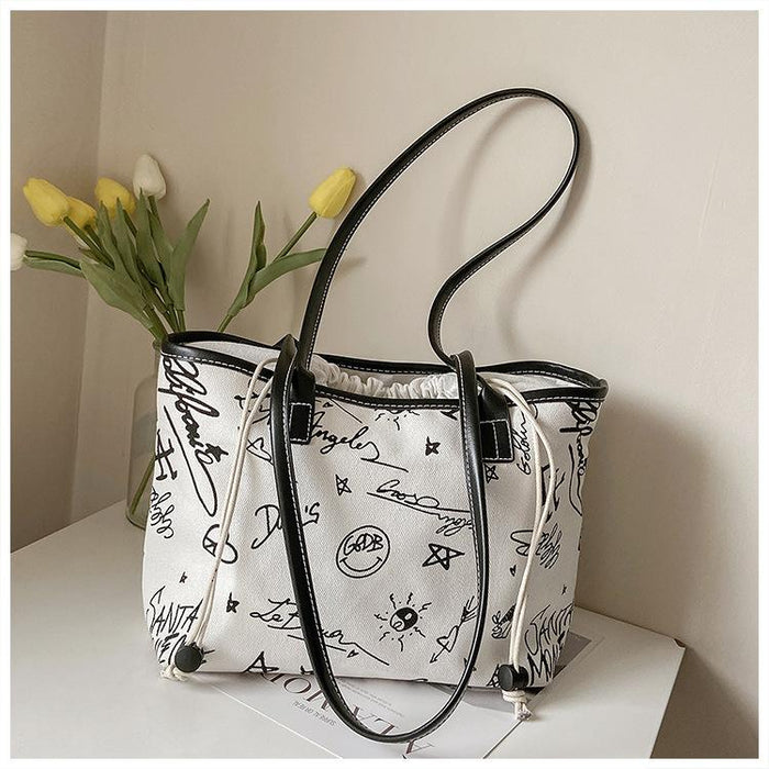 Bulk Jewelry Wholesale white canvas graffiti one-shoulder tote bag JDC-LB-ZM053 Wholesale factory from China YIWU China